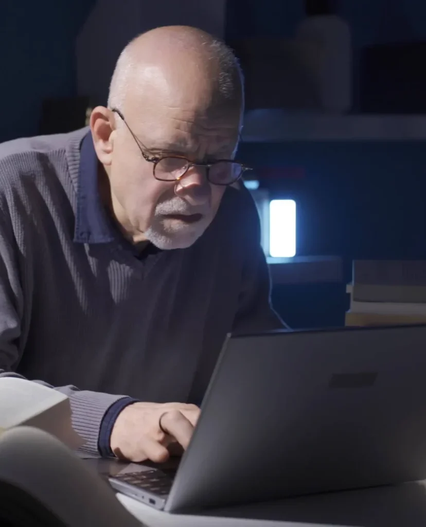 Man reading at night